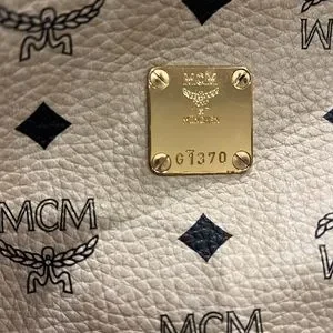 MCM | Bags | 274 Mcm Cream Cognac Backpack Small | Poshmark display picture 1